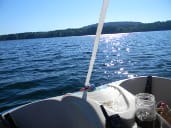 View aboard a pedalboat overlooking an open lake.